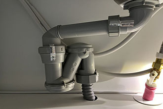 洗面台排水パイプの交換